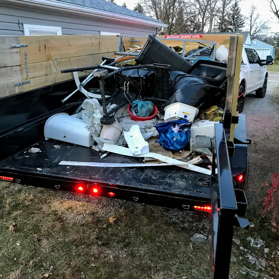 Roll-off dumpster delivered to a residential driveway in Ives Estates
