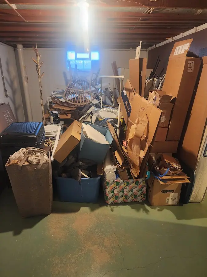 Roll-off dumpster container at job site for 4 Yard Dumpster Rental in Ives Estates